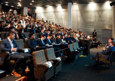 Rows of Columbia University students taking notes during the Weston Talks fireside chat with Blair Effron